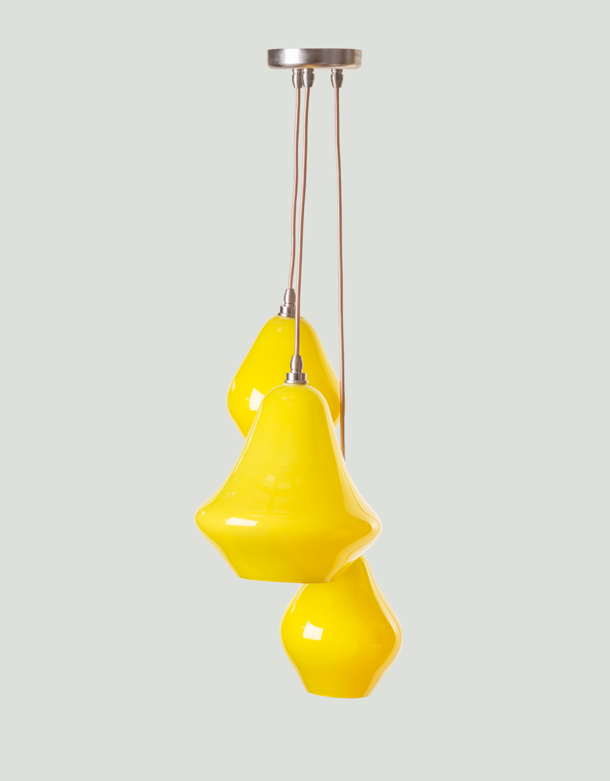 Bathroom cluster chandelier featuring three handmade glass pendant lights in bright yellow.