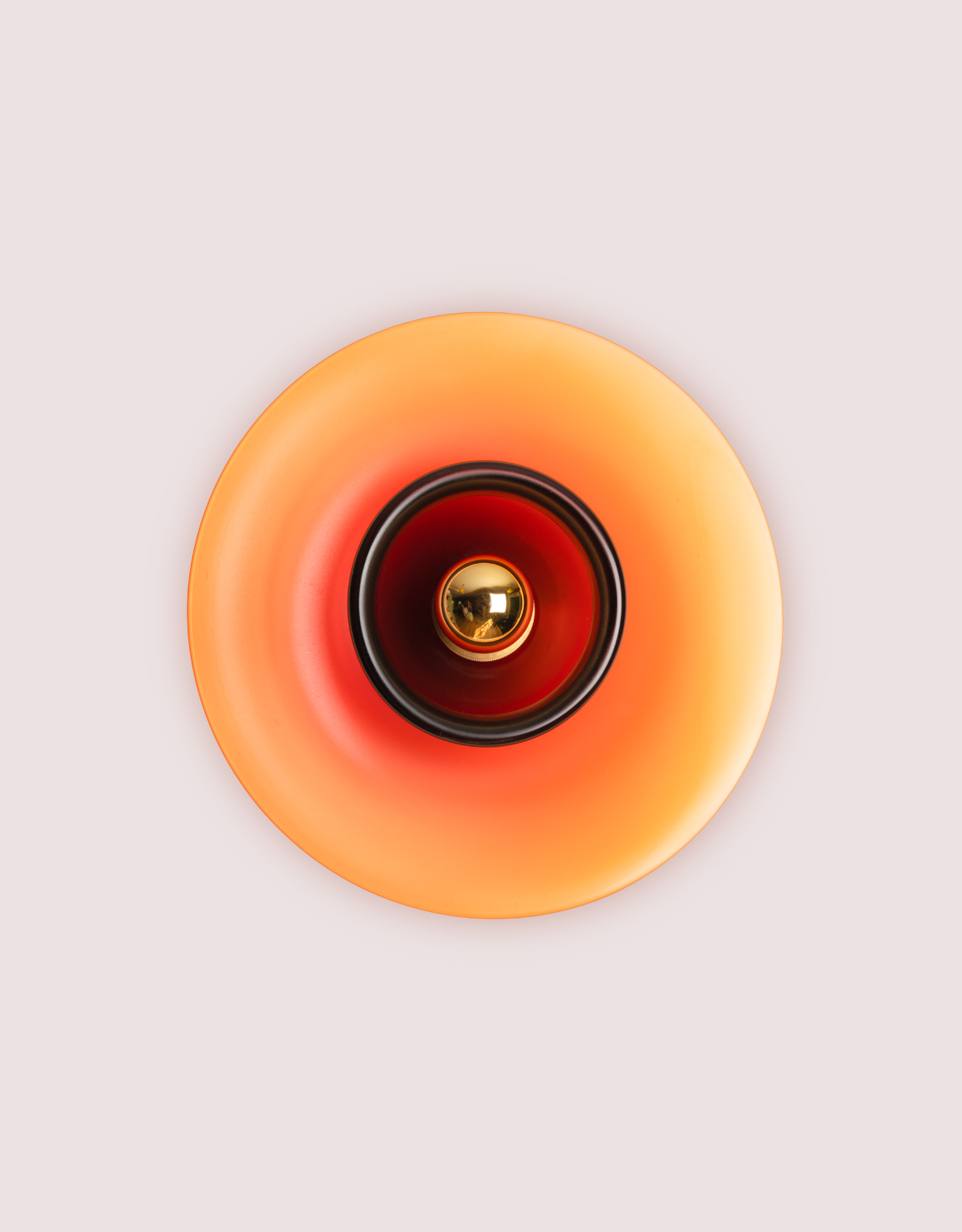 Curiousa-hand-blown-glass-plate-wall-light-garnet-red