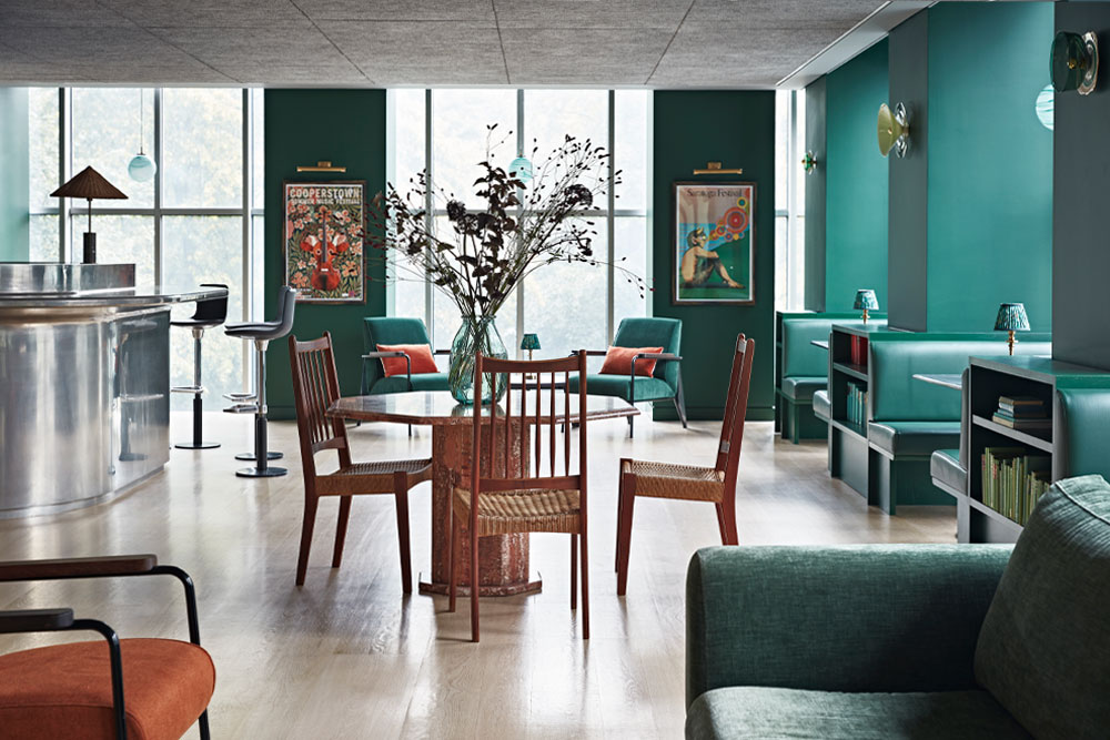 The Design Kitchen at London's Design Museum. Interior decor designed by Matthew Williamson and Fran Lee, featuring hand-blown glass wall lights by Curiousa.