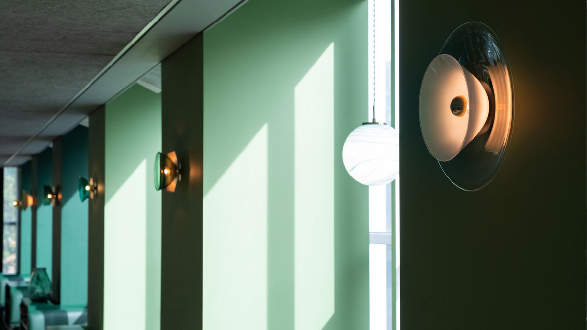 Vintage bone china and glass wall lights featured at the Design Museum in London.