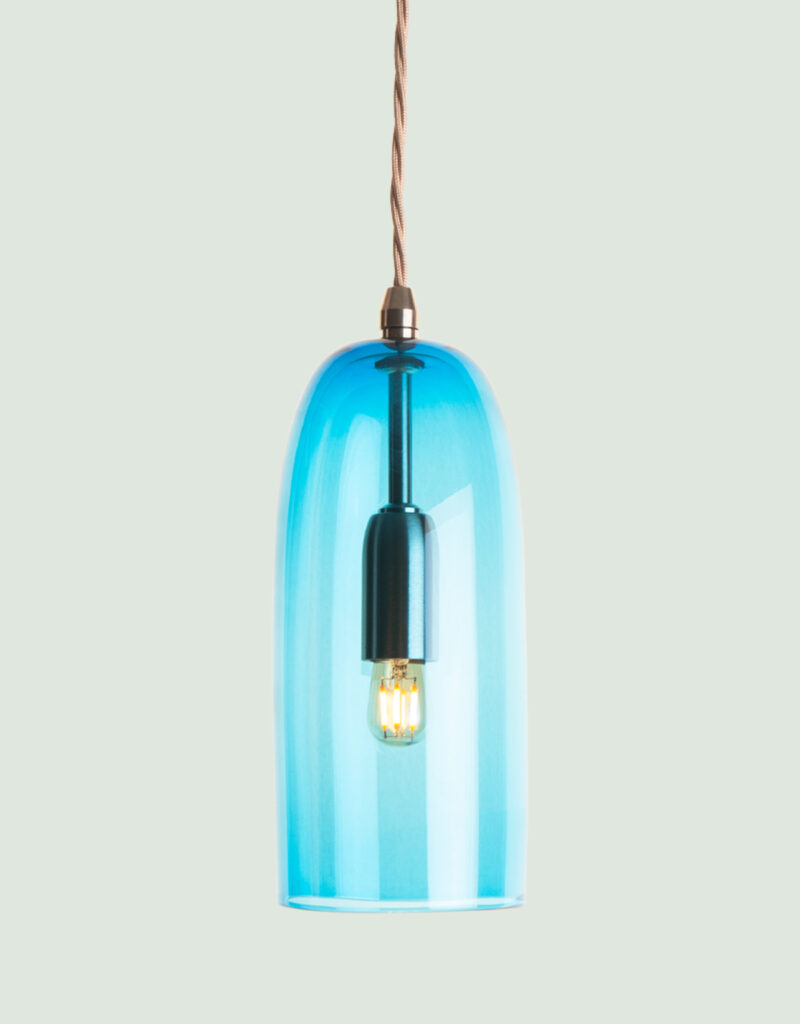 Narrow blue hand-blown glass and brushed steel pendant light.