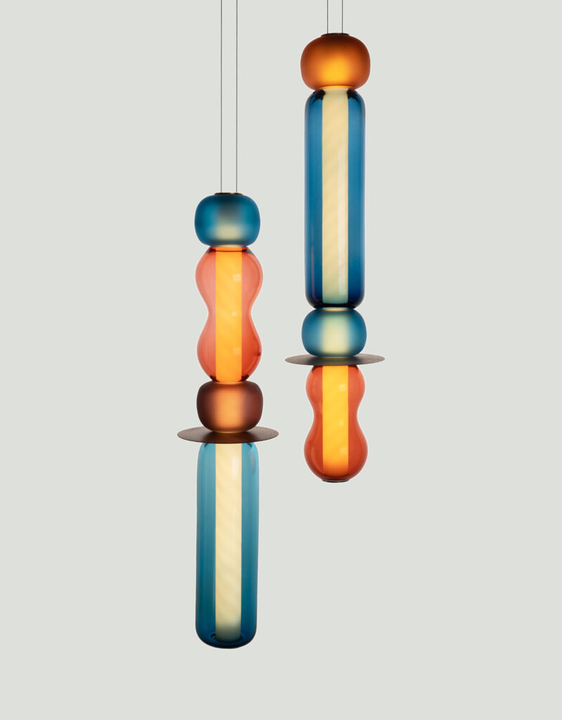Hand-made blue and peach pink glass sculptural pendant light. Made in the UK