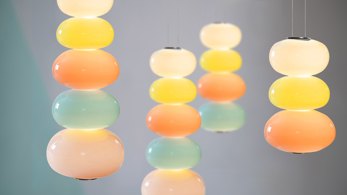 Pastel coloured stacked glass pendant light scuplture designed by Adam Nathaniel Furman and Esther Patterson.