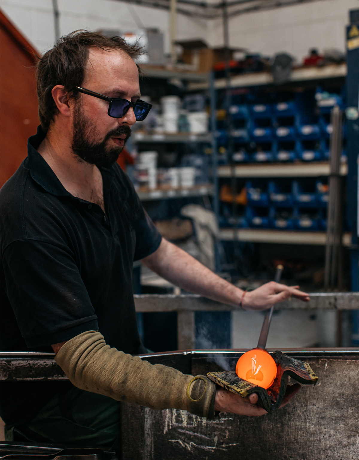 making-decorative-hand-blown-glass-bathroom-wall-lights
